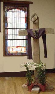 cross at front of church