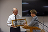 2020 October: Darlene presenting plaque to Terry